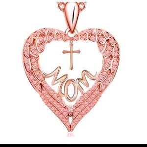 Cooper mom with cross pendant and chain.